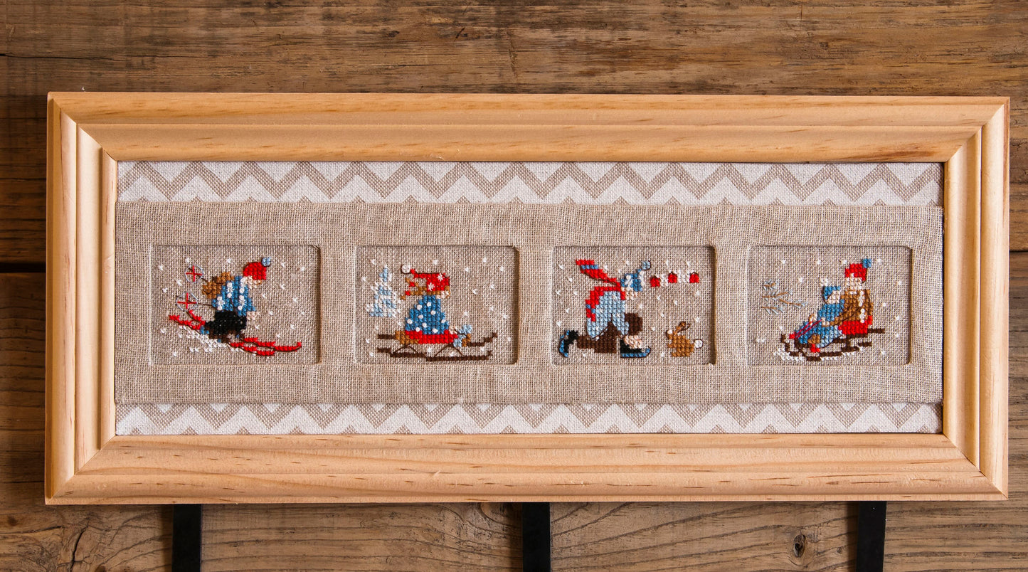 Grille point de croix : portemanteau enfant thème jeux à la neige. Motif 23x33 pts, lin blanc 11 fils, réf. DMC. Grille sur 4 pages.