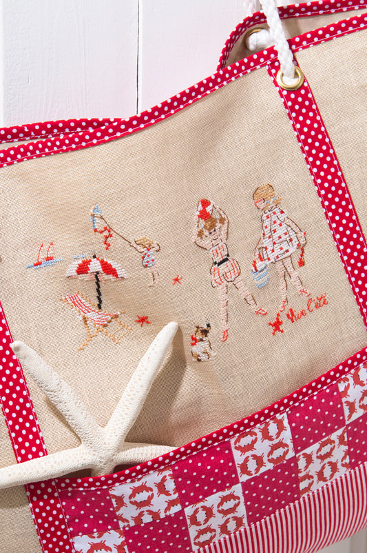 Grille de broderie point de croix : grand sac de plage cabas brodé. Motif 110 x 70 pts, imprimé couleur (Réf. DMC) sur 6 pages. Illustration H. Le Berre.