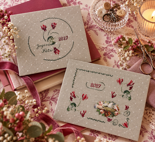 Brodez « Le rouge et le vert » : deux cartes de vœux 2027 aux cyclamens et à la colombe, sur étamine vert pastel 10 fils/cm à petits flocons blancs.