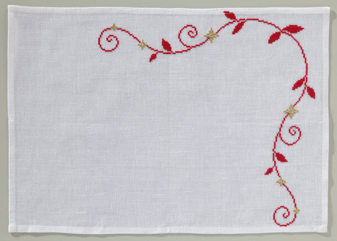 Grille broderie point de croix : sur-nappe coupes de champagne pour Saint-Sylvestre. Imprimée en couleur sur 6 pages. Réf. DMC incluses.