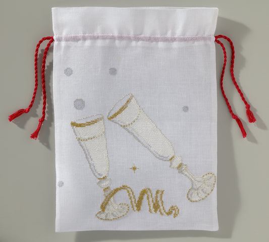 Grille broderie point de croix : sur-nappe coupes de champagne pour Saint-Sylvestre. Imprimée en couleur sur 6 pages. Réf. DMC incluses.