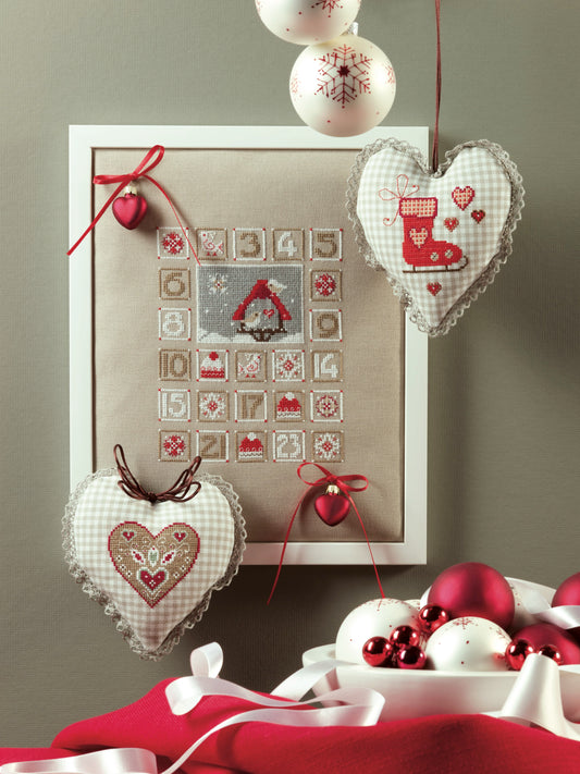 Grille point de croix – En attendant Noël : calendrier de l'Avent brodé avec motifs hivernaux, petits cœurs et patins décoratifs sur toile Murano Zweigart, ambiance Noël tendre et intemporel – Création Point de Croix