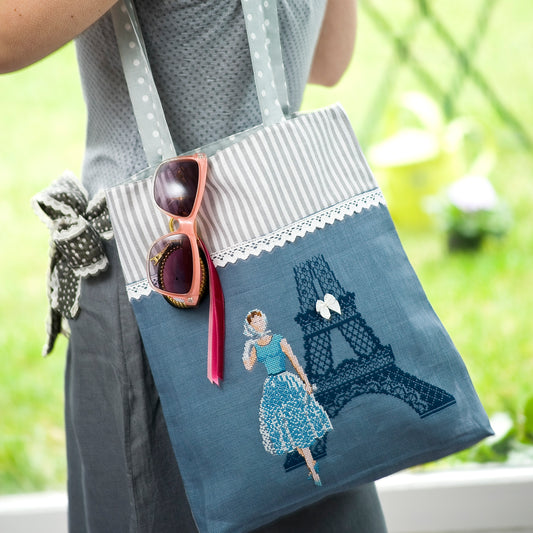 Grille broderie point de croix : sac style années 50 chic parisien. Motif 127x109 pts, env. 23x19 cm sur lin 11 fils ou Aïda 5,5 pts. Ref. DMC.