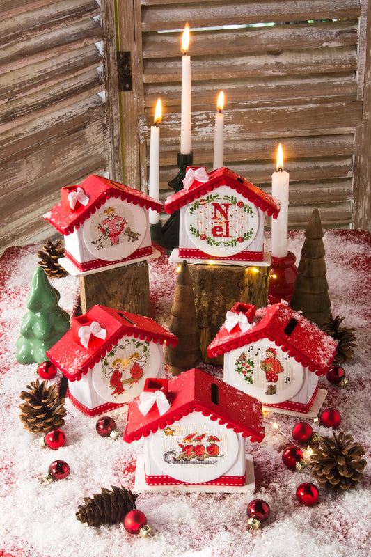 Grille point de croix : maisons de Noël à broder en tirelires décoratives. 5 motifs, 6 pages DMC, sur lin ou Aïda. Un cadeau fait main plein de charme.