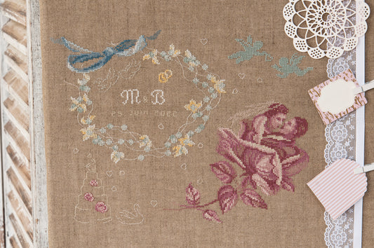 Grille de broderie point de croix « Mariage » par M. Bonnin : livre d'or, pêle-mêle et tambour à broder sur toile bis 11 fils. DMC, 6 pages.