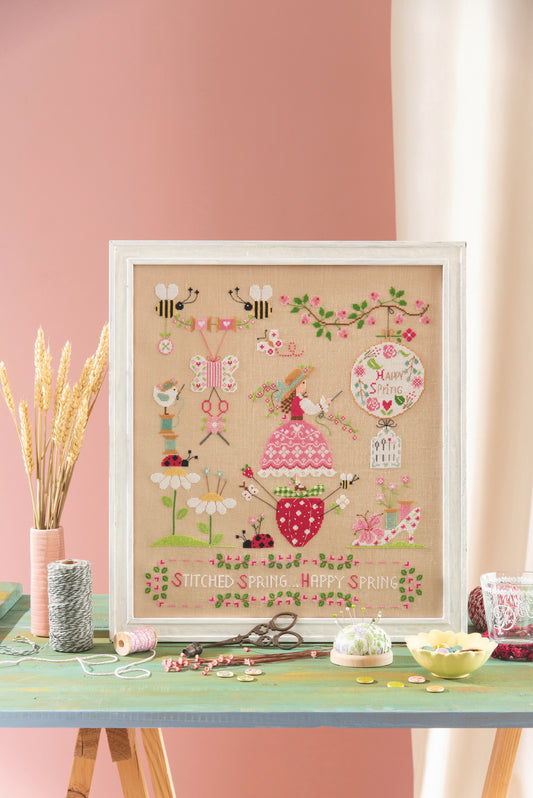 Grille point de croix : scène printanière, brodeuse, abeilles et fleurs. 210×240 pts, lin 12 fils/cm ou Aïda 6 pts/cm. 6 pages couleur, réf. DMC.