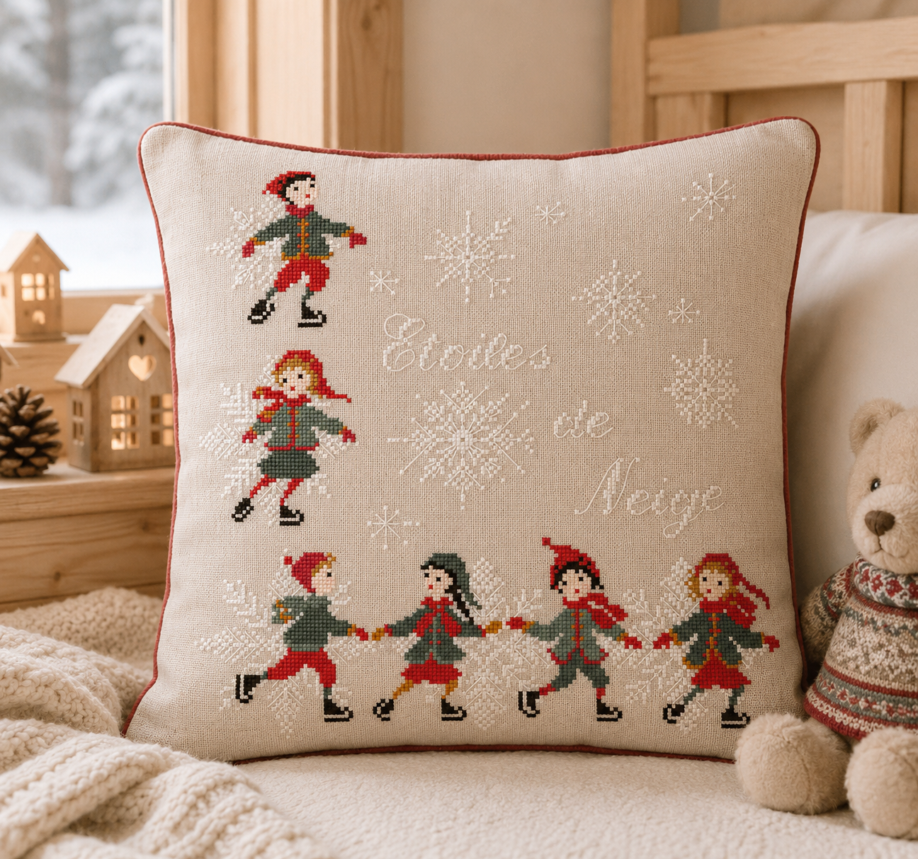 Grille point de croix hiver : enfants patineurs, flocons, farandole. 148x148 pts. Broderie hivernale signée Perrette Samouïloff.
